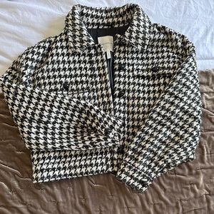 Jacket, black and white with gold metallic threads.